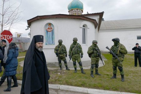 Archbishop Clement front of the goal Ukrainian military camp, March 2014